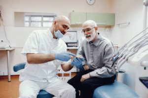 dentist speaking with patient